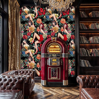 Dramatic vintage pin-up wallpaper with floral motifs in sophisticated study with leather chairs and jukebox