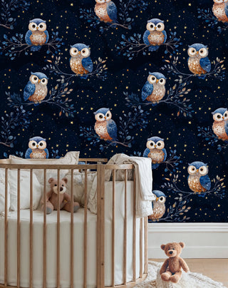 Dreamy owl wallpaper featuring night sky pattern with stars, shown in peaceful nursery with wooden crib