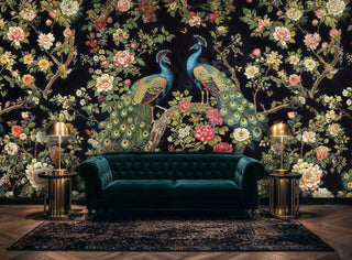 Elegant bird and flower wall mural in teal and coral, shown in modern living space with green velvet sofa