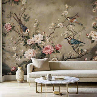 Elegant Chinoiserie Wall Mural with birds and flowers, styled in a modern living room with a light beige sofa and marble table.