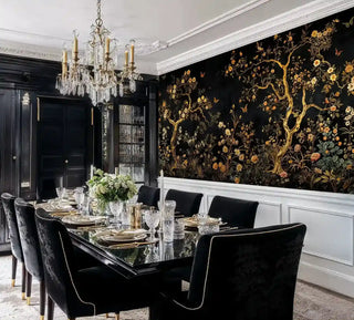 Elegant chinoiserie wallpaper with flowering trees shown in formal dining room with crystal chandelier
