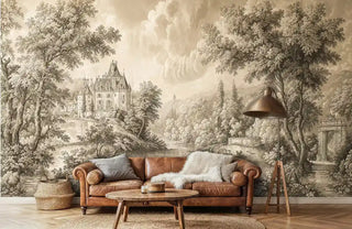 Elegant French landscape wall mural with castle and gardens, shown in living room with leather Chesterfield sofa