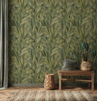 Elegant palm wallpaper with golden accents in living room with natural wood console table