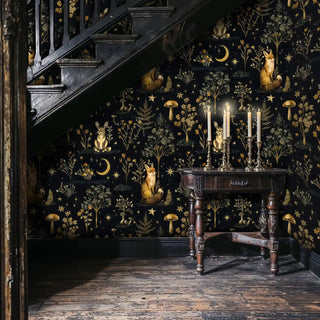Enchanted forest wall mural featuring woodland animals and golden botanicals under rustic staircase