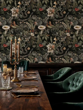Enchanted forest wallpaper with detailed flora and fauna shown in elegant dining room with emerald velvet chairs