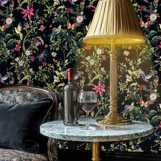 Enchanted garden wallpaper with golden birds and colorful butterflies, in sophisticated lounge with marble side table
