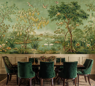 Enchanted lake wall mural with golden catkins and swans in formal dining room with green velvet chairs