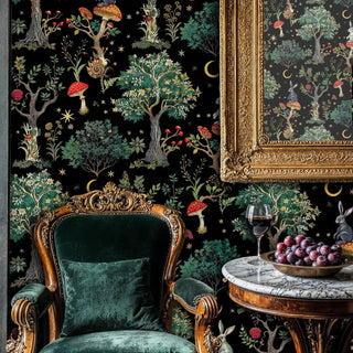 Enchanted woodland wallpaper with celestial details in an elegant dining area with ornate gold mirror frame
