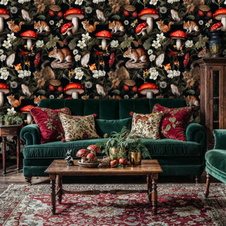 Enchanted woodland wallpaper with mushrooms and creatures, shown in elegant living room with emerald velvet sofa