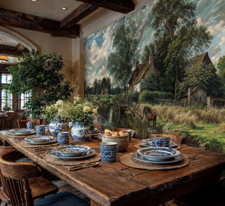 English Countryside Wall Mural with a river and horse, in green and blue, in a rustic dining room with patterned dinnerware.
