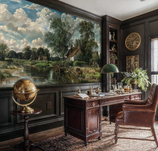 English rural landscape mural featuring stone cottages and river in sophisticated home office with vintage globe