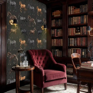 Equestrian horse wallpaper featuring detailed black and brown stallions in motion, shown in elegant study with burgundy armchair