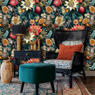 Exotic animal wallpaper with lemurs and passion flowers displayed in a maximalist sitting room with black chair