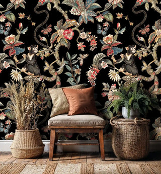 Exotic monkey and butterfly wallpaper with tropical blooms in natural living space with woven baskets and ferns