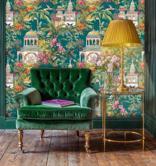 Exotic palace wallpaper with architectural details and tropical birds, displayed in cozy reading nook with tufted chair