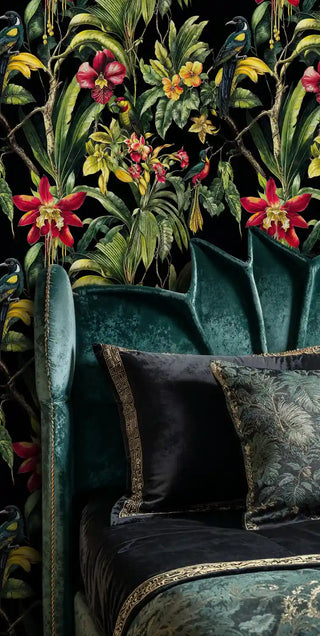 exotic tropical bird wallpaper featuring hibiscus blooms displayed in luxury living room with teal velvet armchair