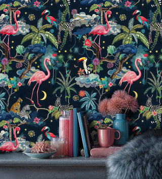 Exotic wildlife wallpaper featuring colorful birds and tropical elements, shown in modern workspace with pink mug