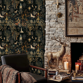 Fairytale castle wallpaper with deer and stars shown in study with stone fireplace and golden stag sculpture