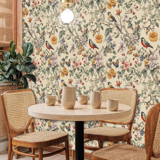 Floral birds wallpaper with butterflies and flowers in modern dining space with cane chairs