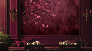Floral cherry blossom wallpaper with pink flowers shown in elegant sitting area with ornate burgundy chairs