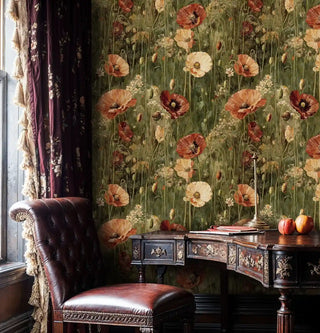 Floral meadow wallpaper with vintage poppies in warm tones, shown in elegant study with antique wooden desk