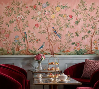 Floral Wall Mural with colorful birds and flowering vines, shown in sophisticated living room with tiered serving tray