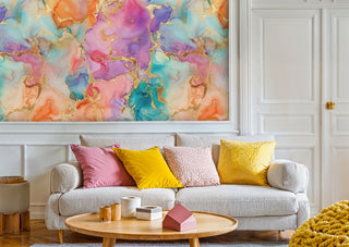 flowing abstract wall mural in purple and coral in living room with grey sofa and yellow cushions