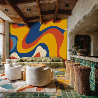 flowing abstract wall mural in warm tones, displayed in rustic lounge with exposed wooden beams