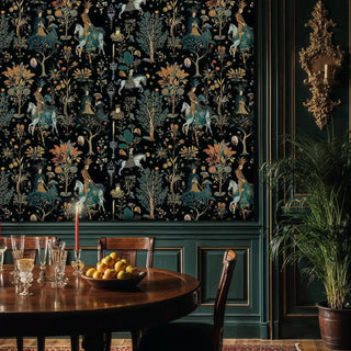 Folk tale wallpaper with horseback riders and golden botanicals on black, shown in elegant dining room with round table