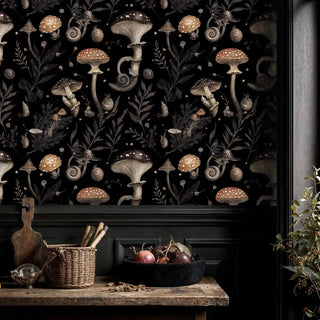 Forest fungi wallpaper featuring detailed woodland elements, styled in modern kitchen with black cabinetry and fruit bowl