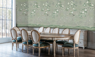 Garden bird wallpaper with flowering branches displayed in bright dining room with round table