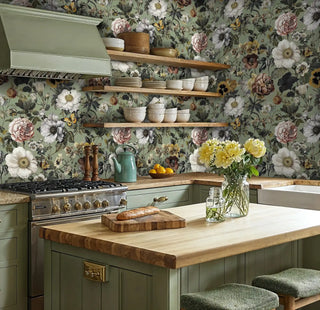 Garden butterfly wallpaper with coral roses and sage backdrop, displayed in kitchen with wooden island and shelving