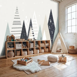 Geometric forest wallpaper with patterned triangular shapes, shown in spacious playroom with modular storage cubbies