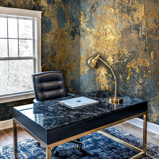 Gilded abstract Wall Mural with gold on deep blue, shown in a home office with black marble desk and brass lamp