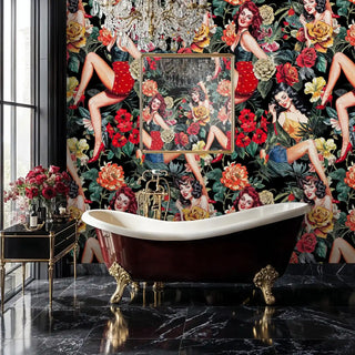 Glamorous pin-up floral wallpaper in black and red tones shown in luxury bathroom with clawfoot bathtub