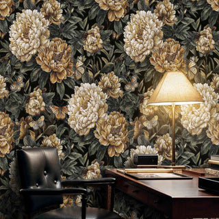 Golden butterfly peony wallpaper displayed in refined home office with brass desk lamp and executive leather chair