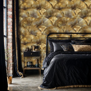 Golden fan pattern wallpaper featuring geometric scalloped design in industrial bedroom with exposed brick wall