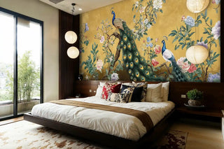 Golden floral peacock wall mural displayed in modern bedroom with platform bed and paper lanterns