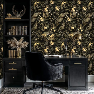 Golden floral wallpaper with ferns and berries, displayed in sophisticated home office with black desk