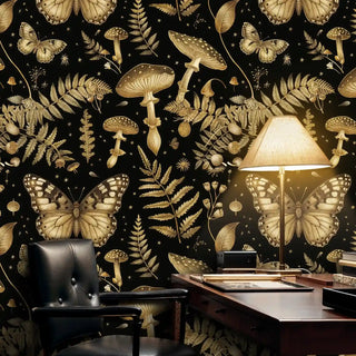 Golden forest wallpaper featuring detailed ferns and butterflies, displayed in warm leather chair setting
