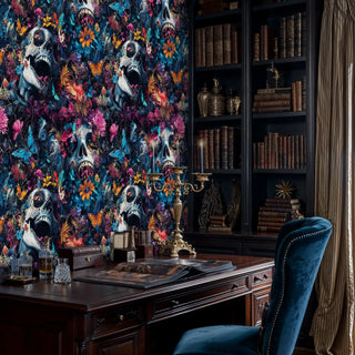 Gothic botanical wallpaper with skulls and butterflies displayed in sophisticated home office with bookshelf