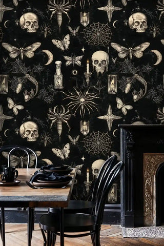 Gothic mystical wallpaper featuring skulls and spider webs in elegant dining room with black chairs