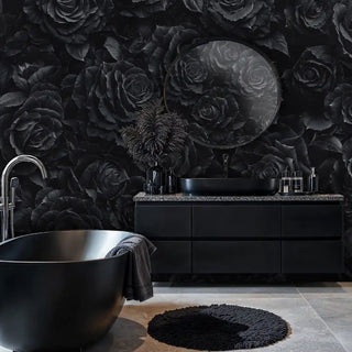 Gothic rose wallpaper featuring detailed black blooms, shown in modern bathroom with freestanding bathtub