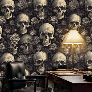 Gothic skulls and roses wallpaper in sepia tones displayed in elegant home office with brass lamp