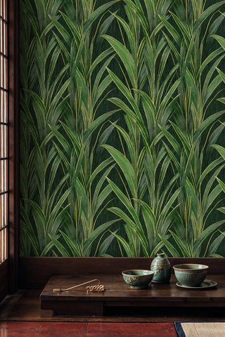 Green and gold grass blade wallpaper in a Japanese-style room with ceramic tea bowls and shoji screen