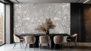 Grey botanical wall mural with cherry blossoms and hummingbirds, featured in contemporary dining room with black marble table