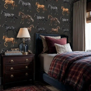 Horse pattern wallpaper with alternating black and brown steeds, displayed in traditional bedroom with plaid bedding
