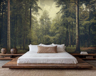 Immersive forest wall mural with tall trees, creating a serene backdrop in a minimalist bedroom with a low wooden platform bed.