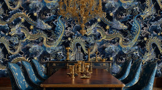 Imperial dragon wallpaper with gold dragons and swirling clouds on navy background, displayed in formal dining room with chandelier