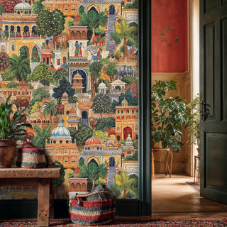 Indian palace garden wallpaper featuring ornate architecture, elephants and lush foliage in a rustic entryway